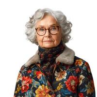 An elderly Caucasian woman with curly gray hair, wearing a floral-patterned coat with a fur collar, staring thoughtfully at the camera. photo