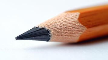 Close-up of a sharpened wooden pencil highlighting its fine tip and natural texture. photo