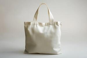 A stylish, empty beige tote bag with two sturdy handles, perfect for everyday use. photo