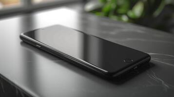 A sleek, modern smartphone resting on a dark marble surface, exuding sophistication and elegance. photo