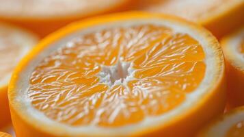 Close-up of a sliced orange, highlighting its vibrant color and intricate inner patterns. photo
