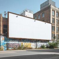 An empty billboard stands against a backdrop of colorful graffiti on a sunny day, adding a touch of urban charm. photo