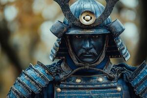 A male Asian warrior in a traditional blue samurai armor, displaying a fierce expression under a dramatic sky. photo
