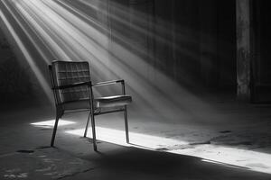A chair in an abandoned building with sunlight shining through the window photo