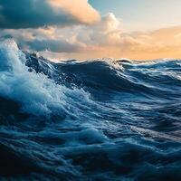 A beautiful sunset over the ocean with waves photo