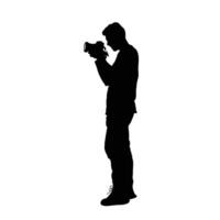 Silhouette of a man standing with a camera focused on capturing the perfect shot A timeless image of passion and dedication in photography vector
