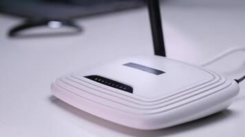 White wi-fi router providing wireless internet access on desk video