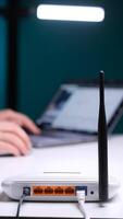 vertical Programmer connecting to internet using wireless router and laptop video