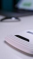 vertical White wi-fi router providing wireless internet access on desk video