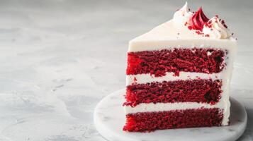 Red velvet cake slice with creamy frosting photo