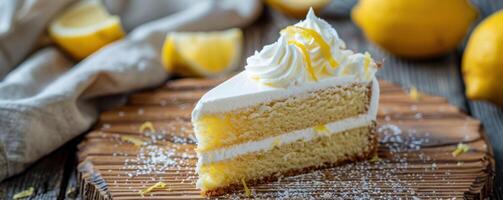 Lemon cake slice with whipped cream on rustic wooden table photo