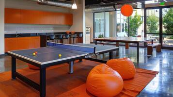 office break area with ping pong tables, bean bags, and modern decor photo