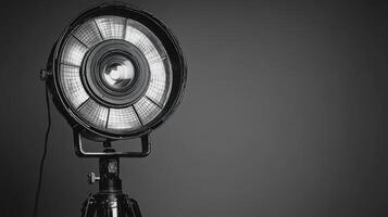 Vintage Studio Spotlight on Tripod Black and White Photography photo