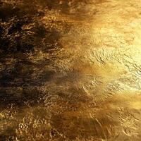 Golden textured surface reflecting light in a warm glow, showcasing intricate patterns and a smooth finish photo