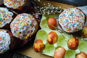 A table with a tray of cupcakes and eggs photo
