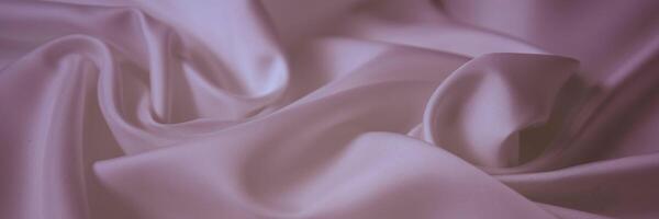 abstract background, ,a wallpaper, fabric waves, color gradient, silk, satin pink magenta gradient photo