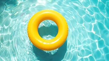 Inflatable ring floating in swimming pool, closeup of photo
