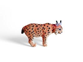 A toy lynx on a white background photo