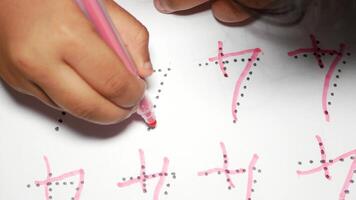 Learning to write numbers with markers on paper video