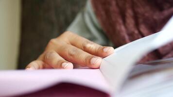 Engaging with a captivating book in a cozy setting video