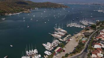 Aerial. a beautiful view of a calm bay with many yachts video