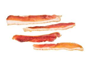 Smoked duck pastrami meat slices isolated on white background. top view photo