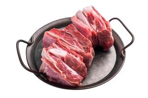 Raw lamb Riblets, fresh mutton meat with rib bone isolated on white background. top view photo
