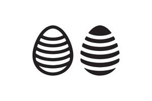 Two black and white eggs with stripes on them vector