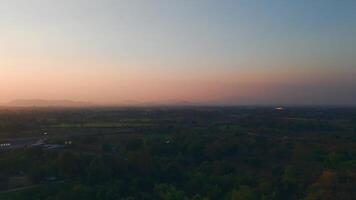 This peaceful aerial view captures the soft morning glow, creating a tranquil and mesmerizing atmosphere. Perfect for relaxation, meditation, or background visuals. video