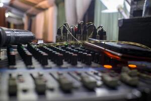 Close-Up of Audio Equipment in a Recording Setup photo