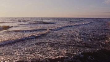 Large foamy waves at high tide, drone . Sea waves from a bird's eye view. video