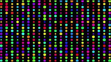 A colorful pattern of dots on a black background video