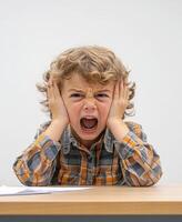 student experiencing frustration while studying, screaming and holding his head, highlighting challenges in education and learning difficulties photo