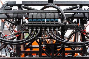 A close up of a large machine with a lot of wires photo