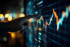 A business person interacting with charts and diagrams on a stock market screen.., photo