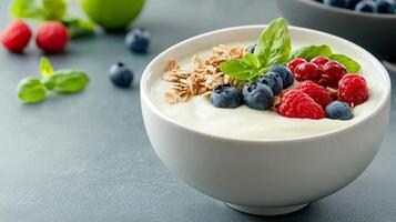a Fresh Healthy Breakfast Bowl with Creamy yogurt bowl topped and fresh berries. photo