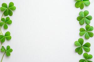 a Saint Patrick's day background with sprayed green clover leaves or shamrocks.. photo