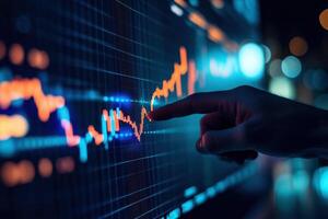 business person interacting with charts and diagrams on a stock market screen. photo