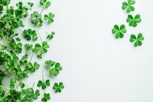 Saint Patrick's day background with sprayed green clover leaves or shamrocks.. photo