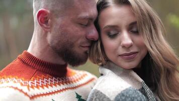 Enamored pair enjoying each other's company during the date. Man and woman having rendezvous at the natural background of countryside. video