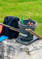 View of garden tools. Bucket and garden tools. Workers tools for spring cleaning photo