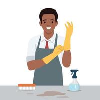 Man wearing an apron and yellow gloves, preparing to clean with a spray bottle and brush on a table. vector