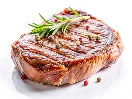 Freshly cooked beefsteak. Meat cooking. Steak with greens photo