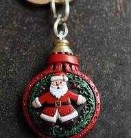 A keychain with a santa clause photo