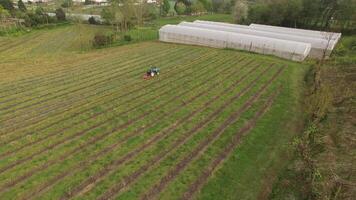 Aerial View Tractor vehicles working at field video