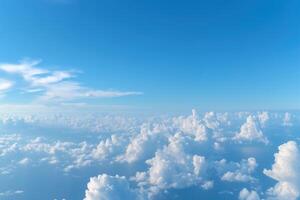 Blue sky background with cumulus clouds, view from above photo