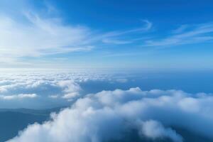 Blue sky background with tiny clouds. Panoramic view above the clouds. photo