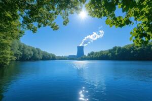 Nuclear power plant on the shore of the lake in the forest photo