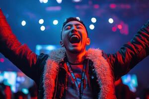 Energizing Moment of a Victorious Esports Player Celebrating at a Thrilling Event photo