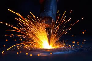 Welder Creating Sparks While Working in an Industrial Environment for Manufacturing Projects photo